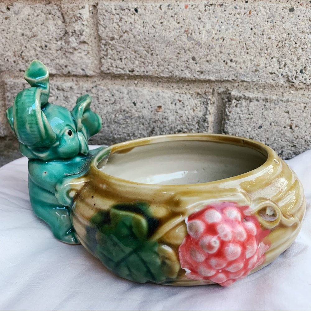 Adorable vintage Majolica green elephant planter with grapes and leaves detail